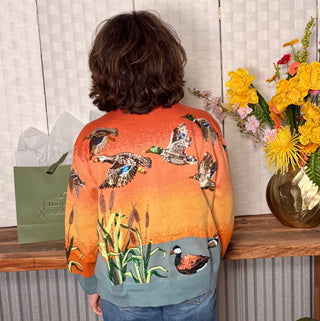 Queen of Sparkles Ducks Flying Sunrise Sweater