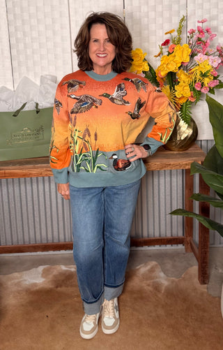 Queen of Sparkles Ducks Flying Sunrise Sweater