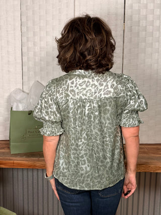 Voy Olive Smocked Short Sleeve V Neck Animal Print Top