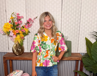 Voy Half Zip V-Neck Floral Peplum Top